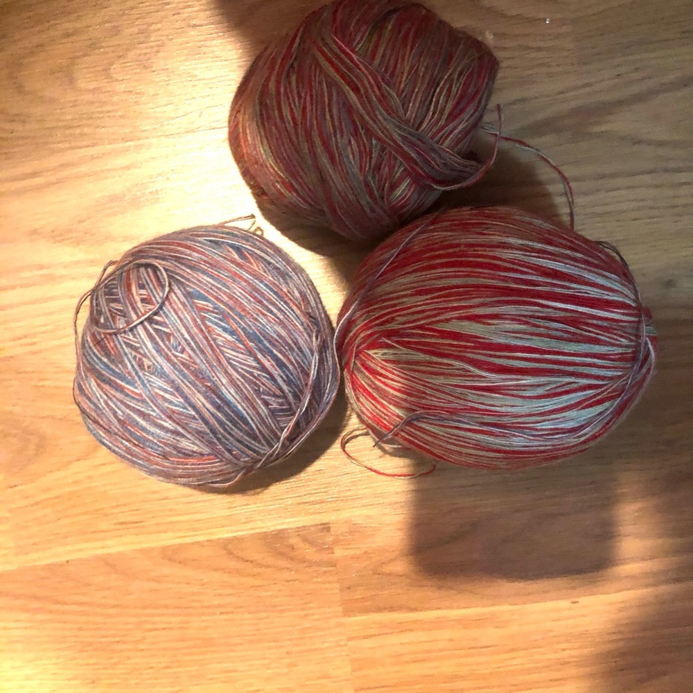 Multicolor thin thread yarn Balls: 2 red/white balls and 1 red/white/blue ball